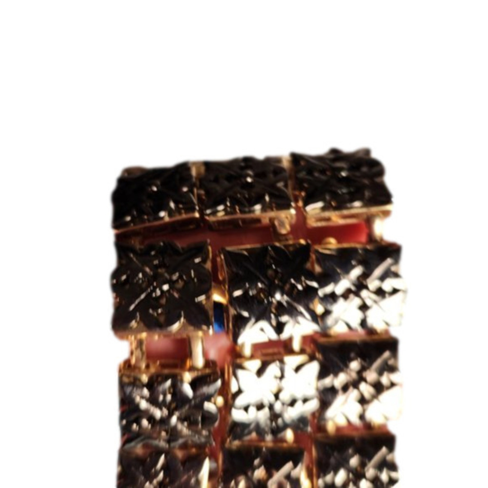 P109. Goldtone and Pewter Statement Bracelet